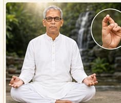 Guruji showing Vayu Mudra